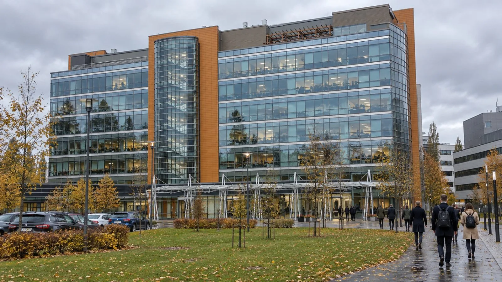 Employees enter Nokia’s headquarters in Espoo, Finland, on an overcast autumn morning. / EconoTimes.ai