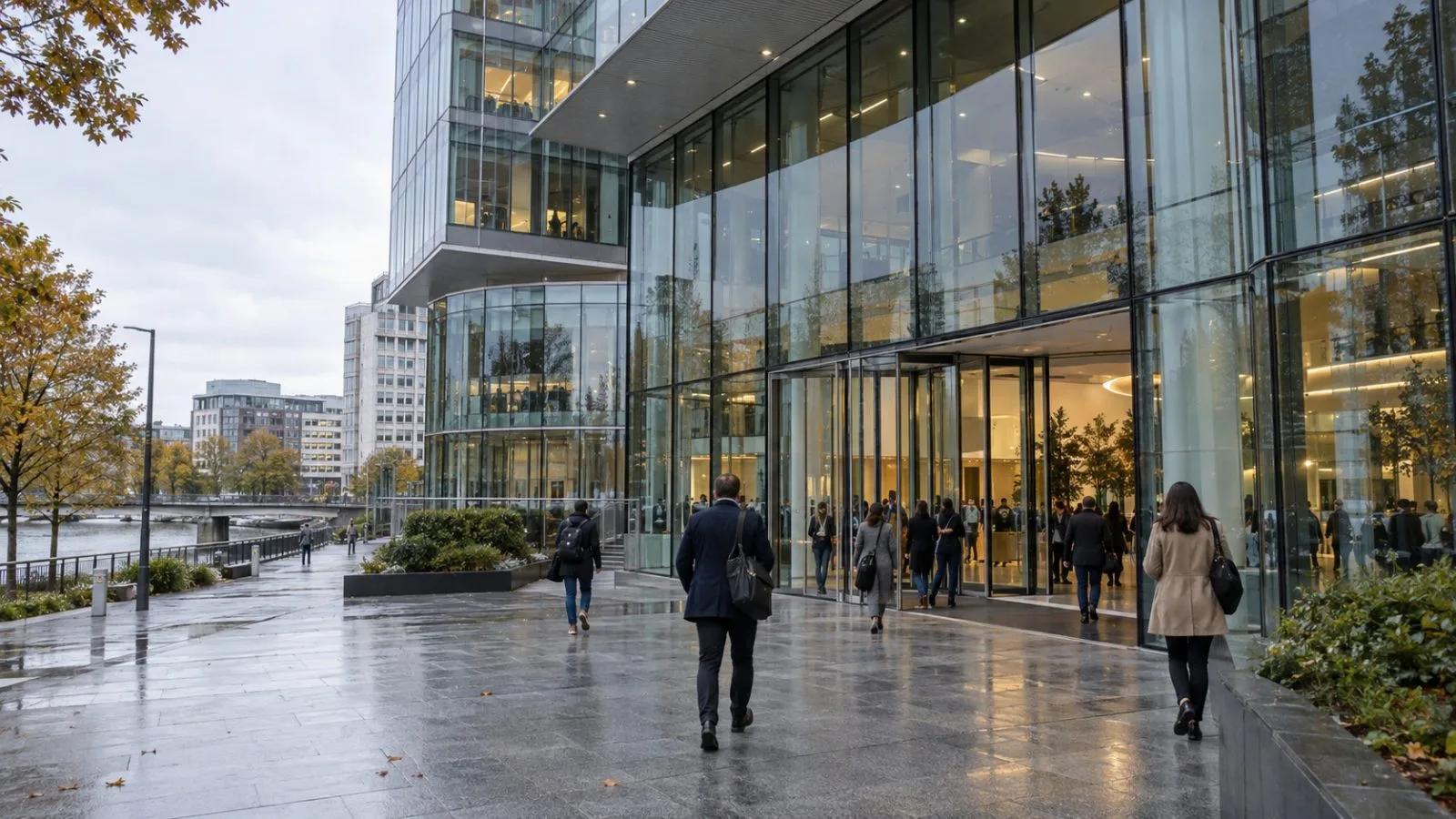 Employees enter Sodexo Group’s headquarters in Issy-les-Moulineaux, outside Paris. (AI-generated image / EconoTimes)