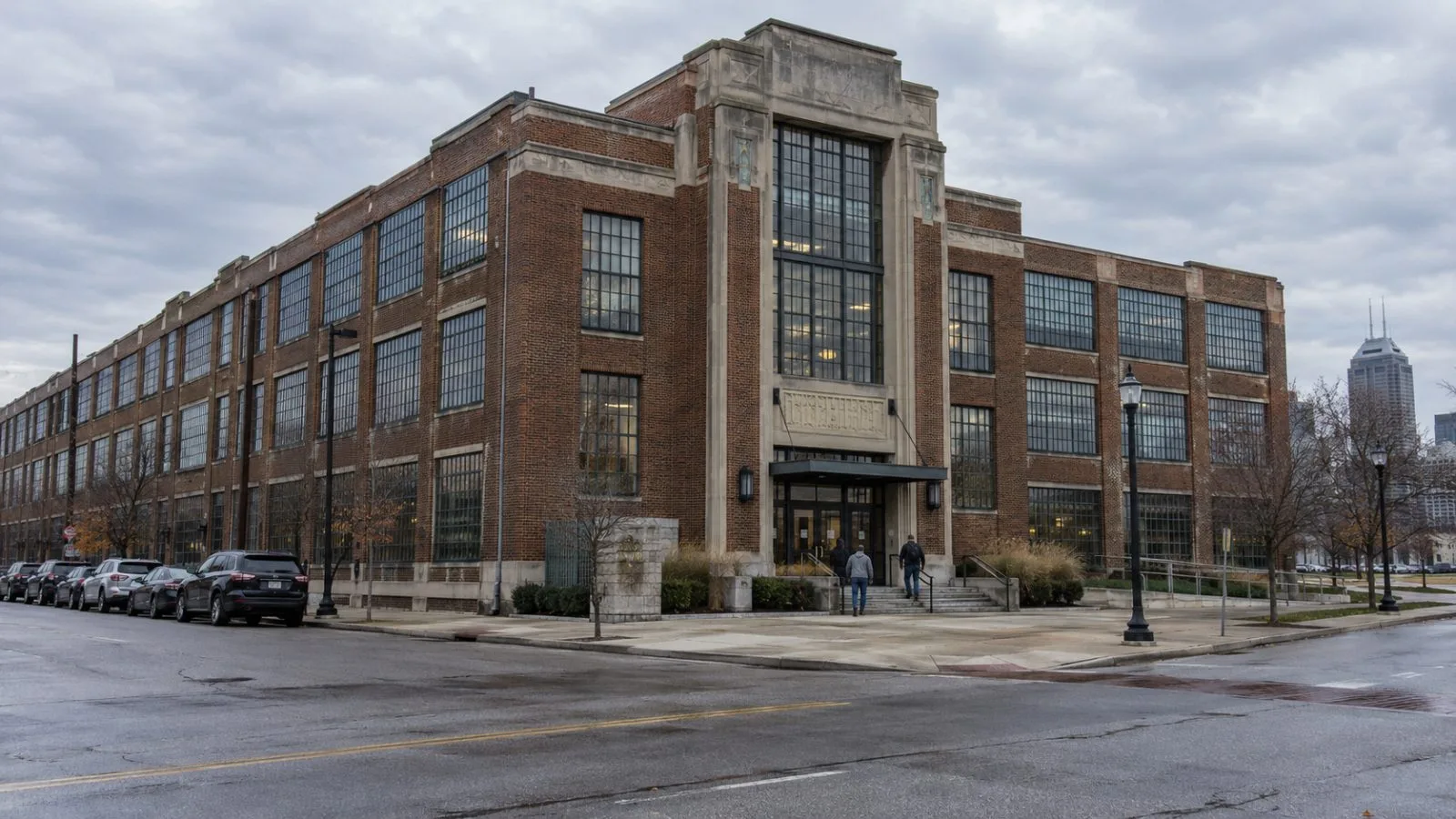 Workers enter the Stutz Building, Calumet’s headquarters, in downtown Indianapolis. (AI-generated image / EconoTimes)
