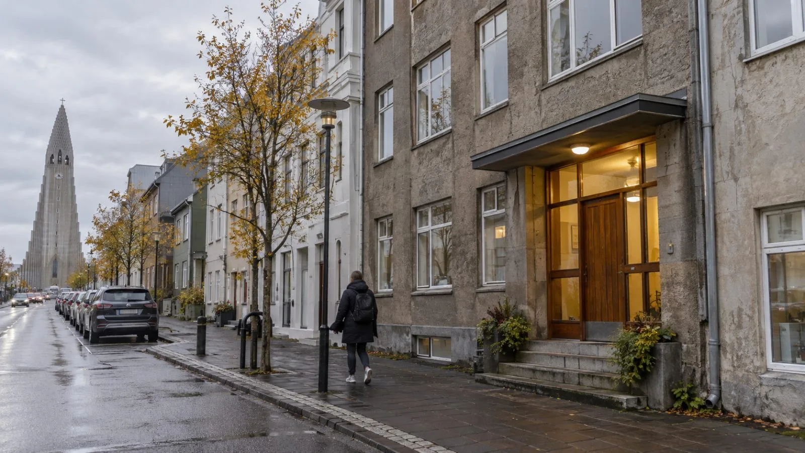A passerby walks along Skólavörðustígur in central Reykjavík, Iceland. (AI-generated image / EconoTimes)