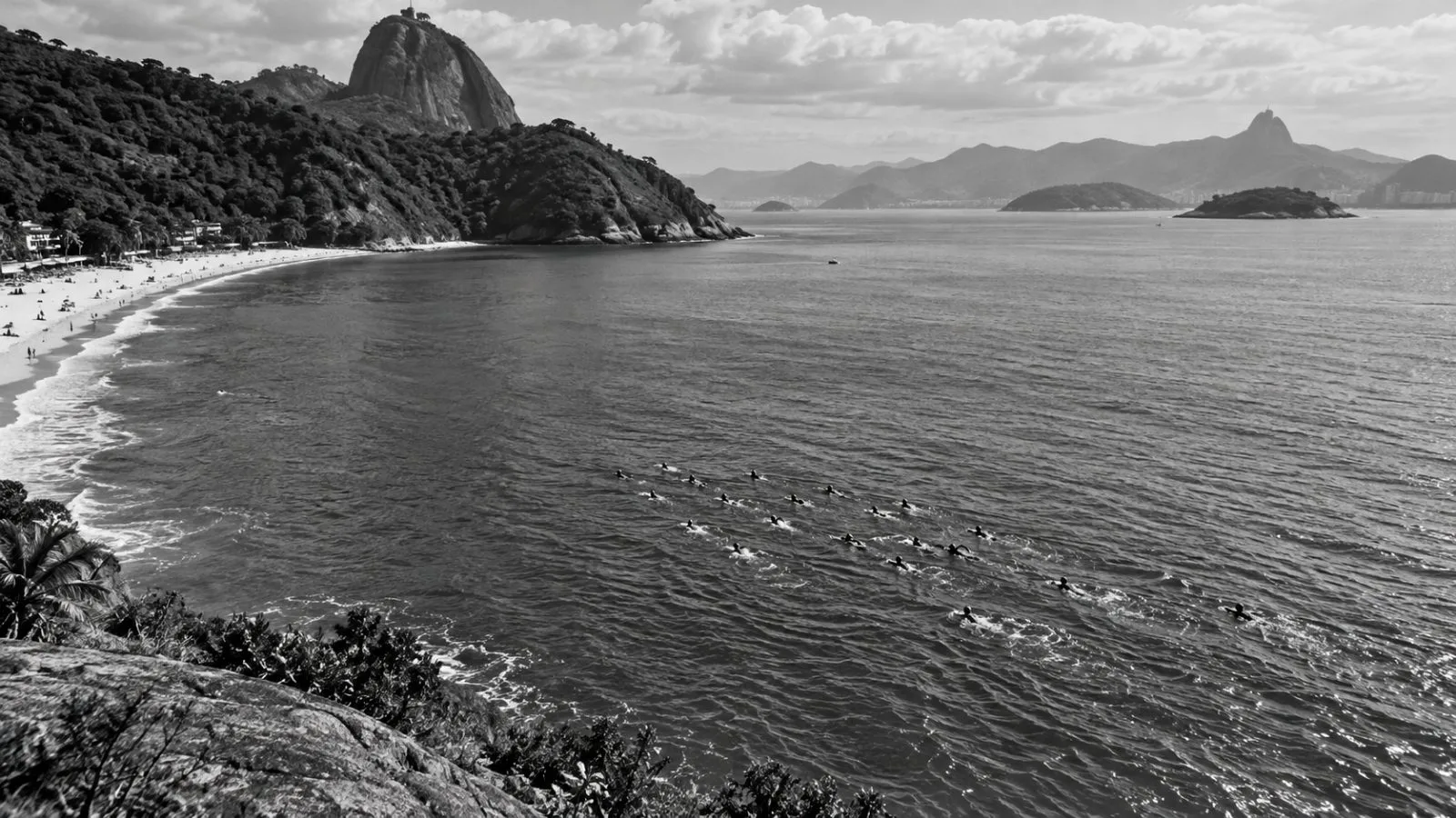 Swimmers gather offshore at Praia Vermelha in Rio de Janeiro. (AI-generated image / EconoTimes)