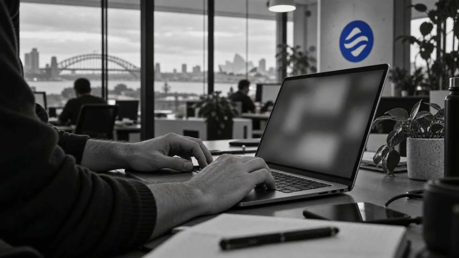 An anonymous analyst reviews smart-contract code at a workspace in Sydney, Australia. / EconoTimes.ai