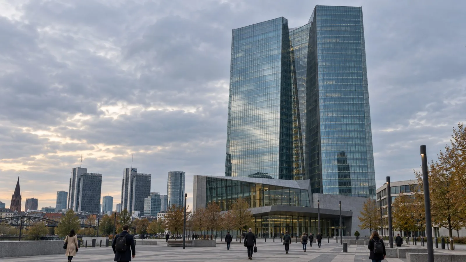 The European Central Bank headquarters stands in Frankfurt's Ostend district on an overcast afternoon. / EconoTimes.ai