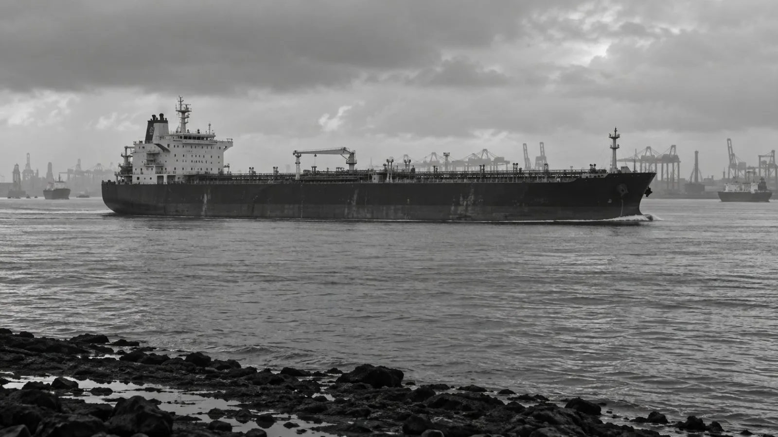 A product tanker passes cargo terminals along the Singapore Strait near Singapore. (AI-generated image / EconoTimes)