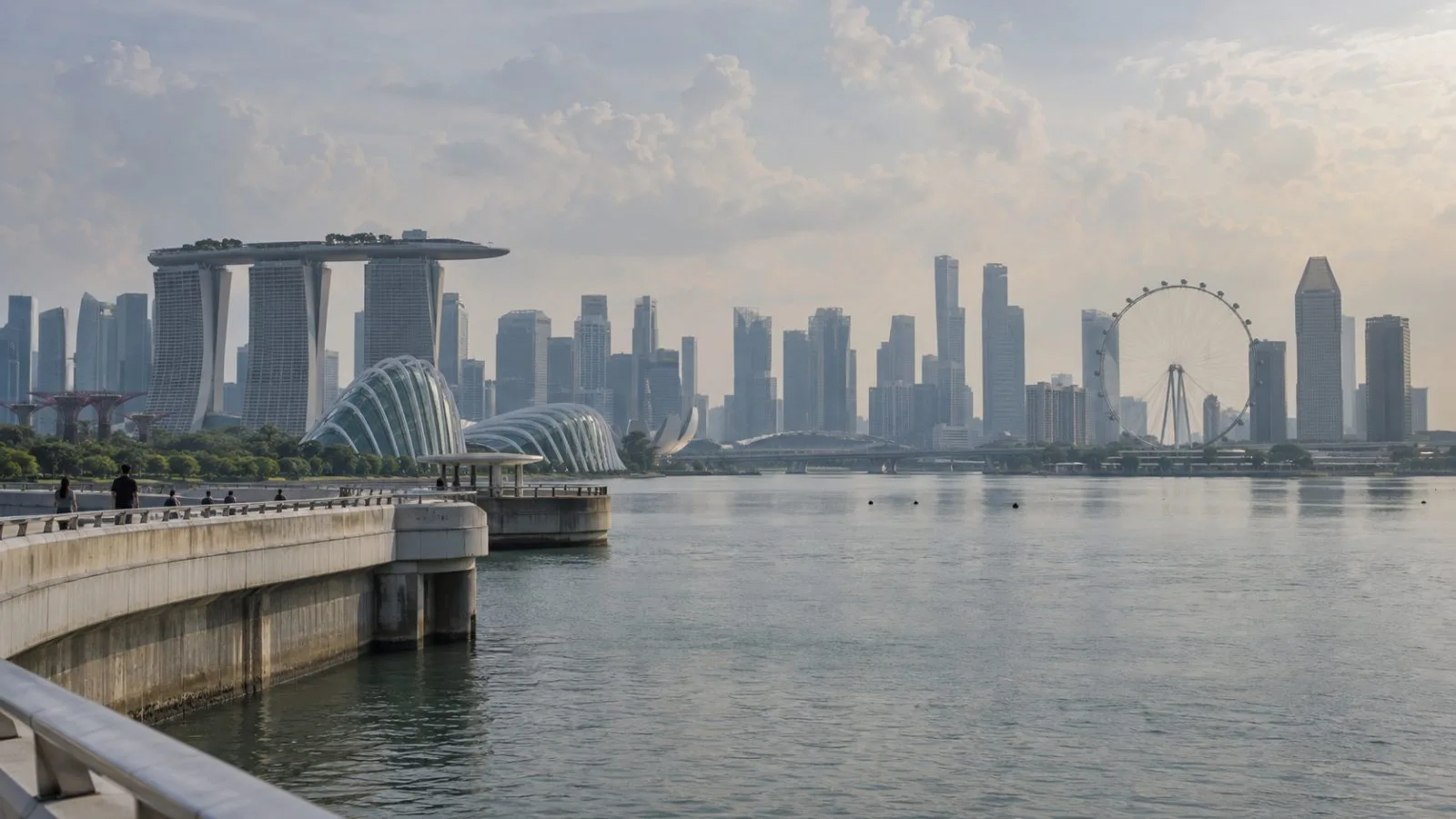 Haze softens the Singapore skyline beyond Marina Barrage on Sunday afternoon. (AI-generated image / EconoTimes)