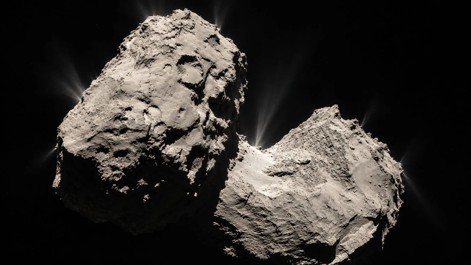 Comet 67P's double-lobed nucleus and jets appear in Rosetta's July 2015 view. / EconoTimes.ai