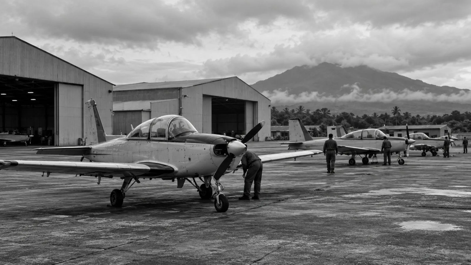 A propeller trainer aircraft sits on the apron at Fernando Air Base in Batangas, Philippines. (AI-generated image / EconoTimes)