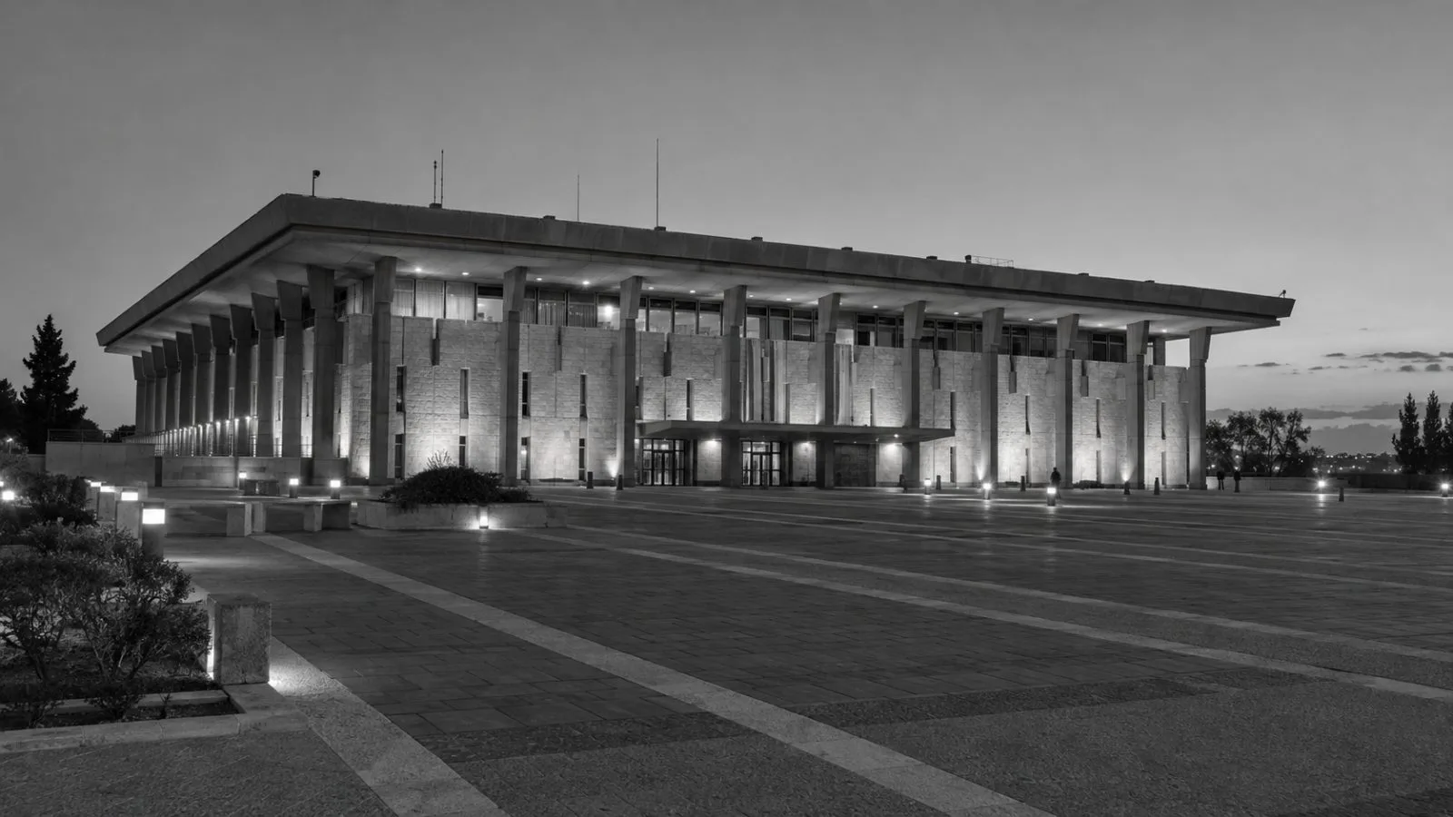 The Knesset stands above a quiet forecourt in Jerusalem on Monday evening. (AI-generated image / EconoTimes)