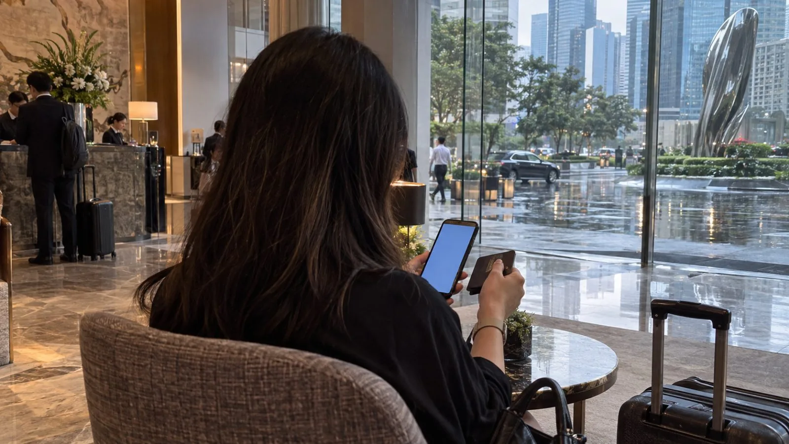 A traveler checks a hotel reservation on a phone in a Singapore hotel lobby. (AI-generated image / EconoTimes)