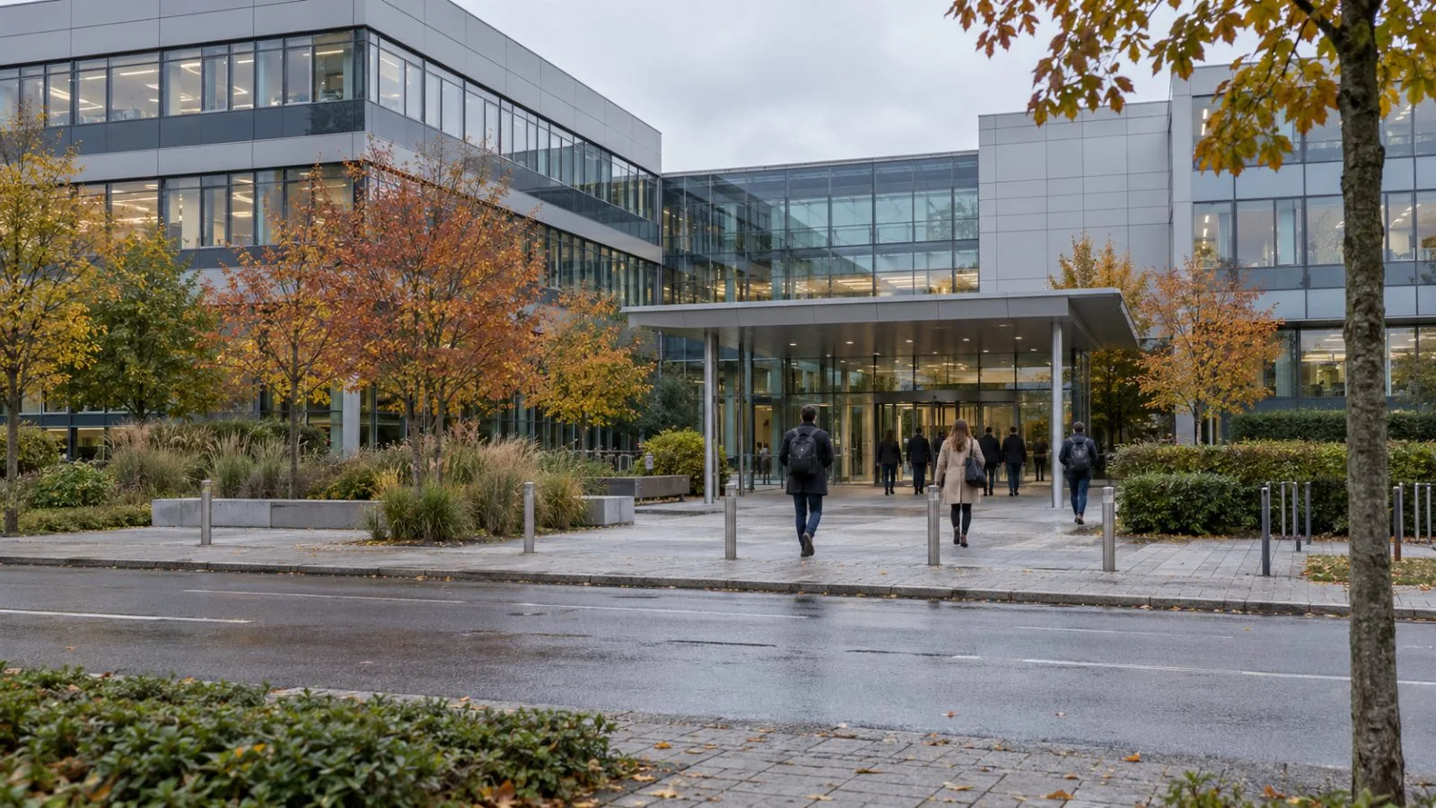 Visitors cross the grounds outside SAP’s headquarters in Walldorf, Germany. / EconoTimes.ai