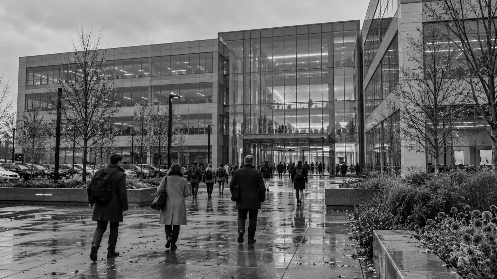 Employees enter Bausch Health’s headquarters on a cloudy autumn morning in Laval, Quebec. (AI-generated image / EconoTimes)