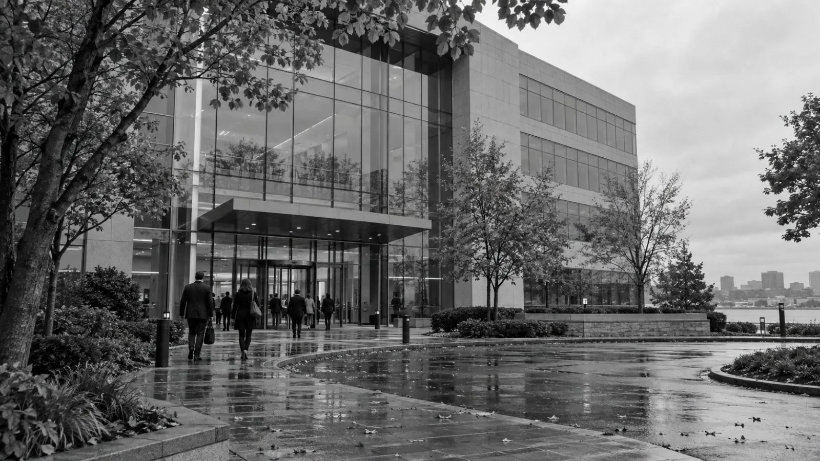 Employees enter Synchrony Financial's headquarters in Stamford, Connecticut, on an overcast morning. (AI-generated image / EconoTimes)