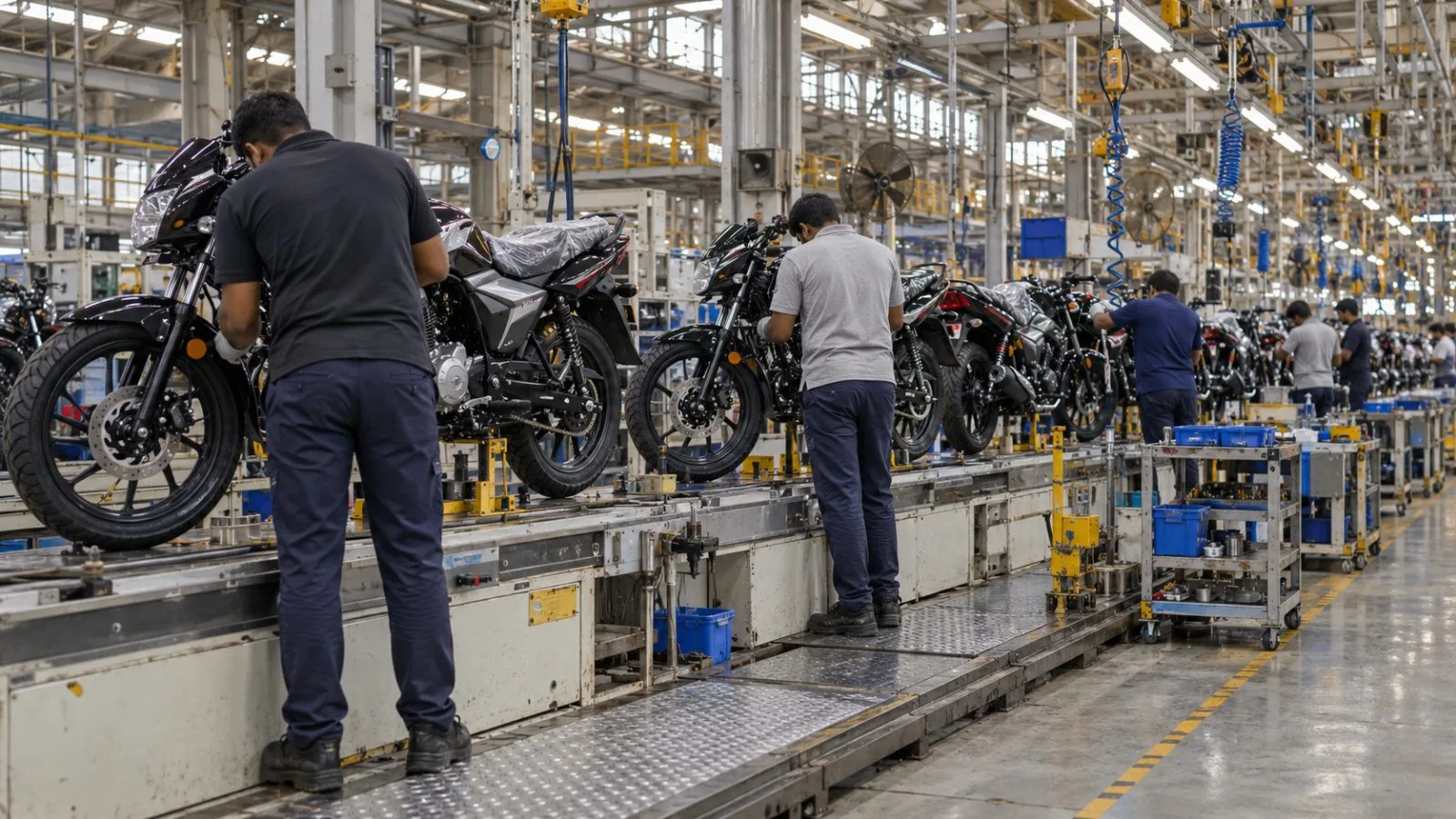 Motorcycles move along an assembly line at Bajaj Auto’s factory in Pune, India. / EconoTimes.ai