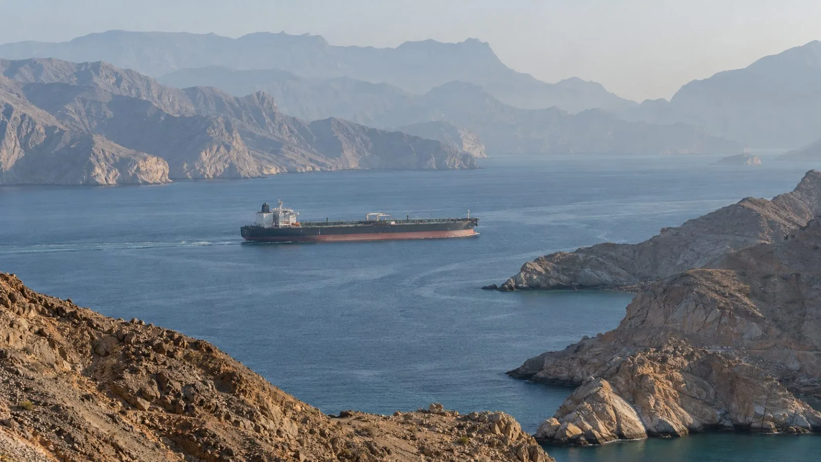 An oil tanker passes through the Strait of Hormuz near Musandam, Oman. (AI-generated image / EconoTimes)