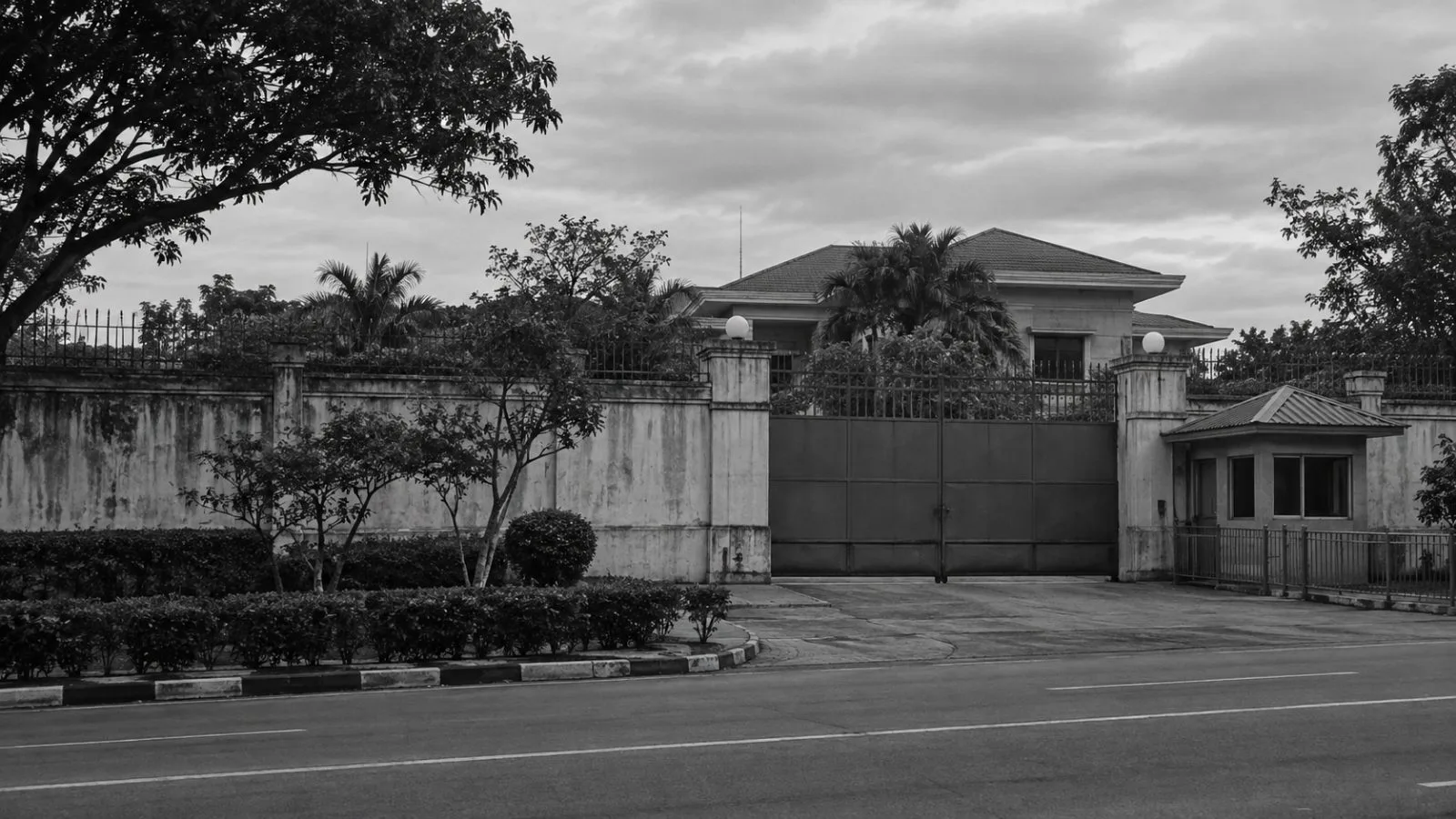 A closed gate marks a residential compound in Naypyidaw, Myanmar. (AI-generated image / EconoTimes)