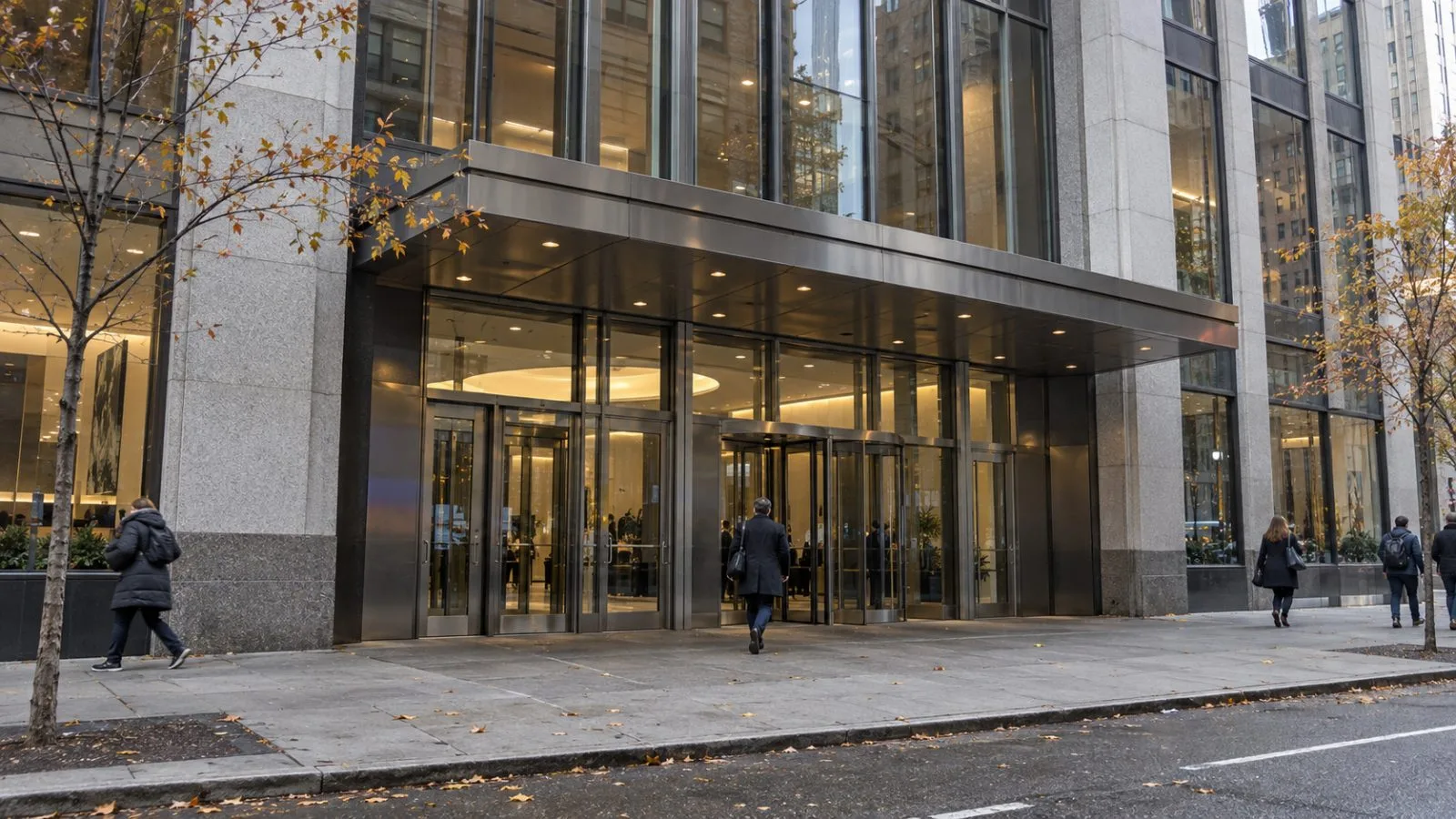 The CBS Broadcast Center entrance stands on a Manhattan street under an overcast autumn sky. (AI-generated image / EconoTimes)