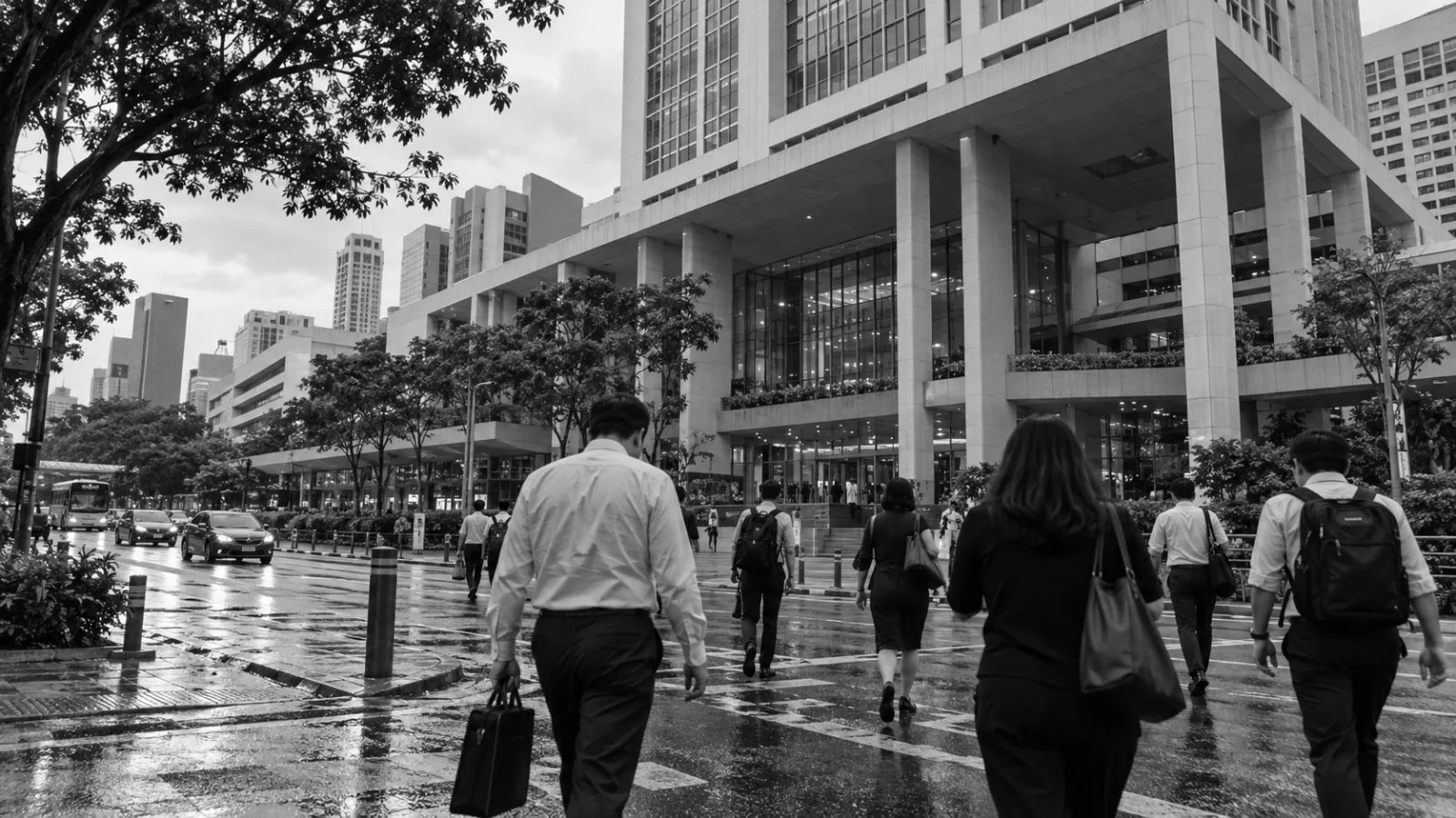 Mature pedestrians pass the Ministry of Manpower headquarters on Havelock Road in Singapore. (AI-generated image / EconoTimes)