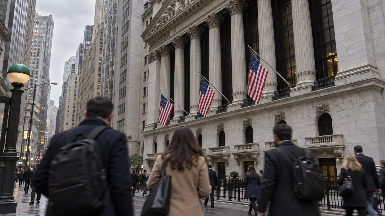 Pedestrians pass the New York Stock Exchange facade in Lower Manhattan, New York. / EconoTimes.ai