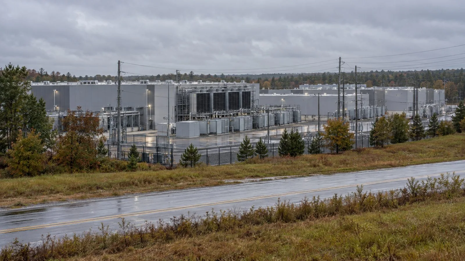 Industrial buildings stand near utility lines at the CLT1 campus in Moore, South Carolina. (AI-generated image / EconoTimes)