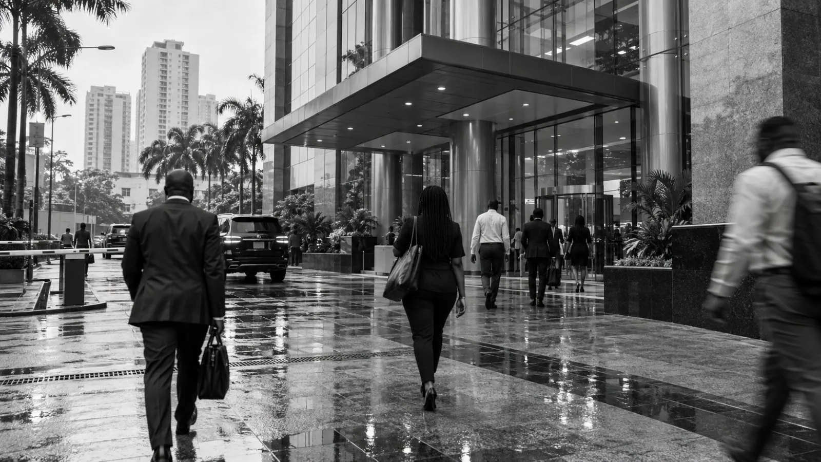 Pedestrians pass an office entrance on Akin Adesola Street in Lagos, Nigeria. (AI-generated image / EconoTimes)