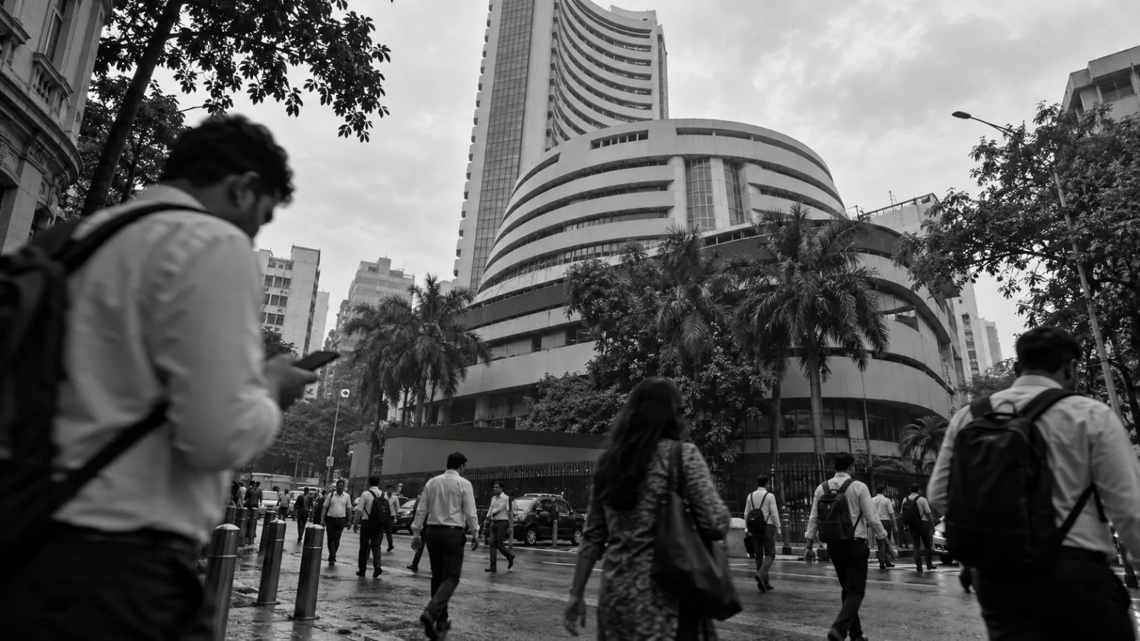 Pedestrians pass the Bombay Stock Exchange building on Dalal Street in Mumbai (AI-generated image / EconoTimes)