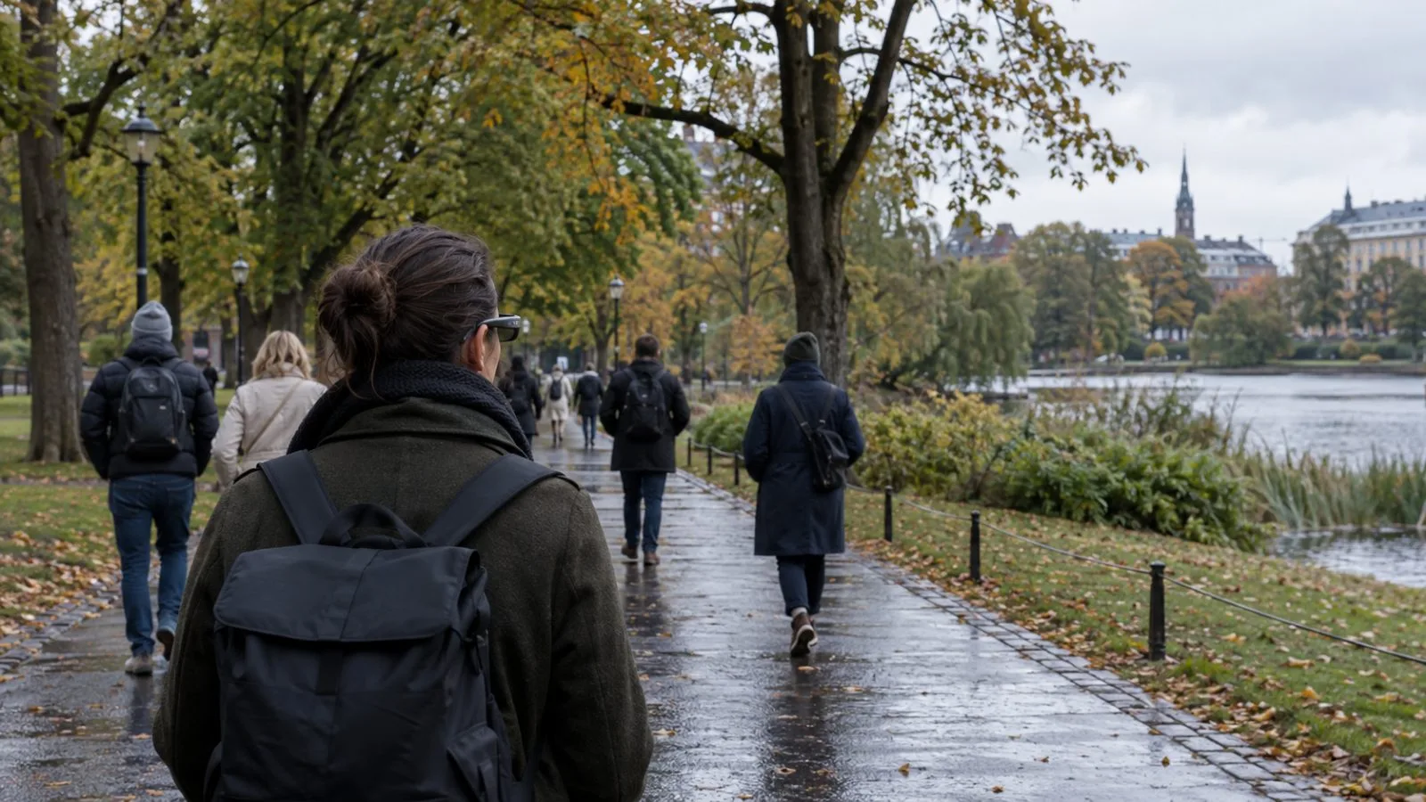 A passerby wearing camera-equipped smart glasses walks among visitors in an Oslo public park. (AI-generated image / EconoTimes)