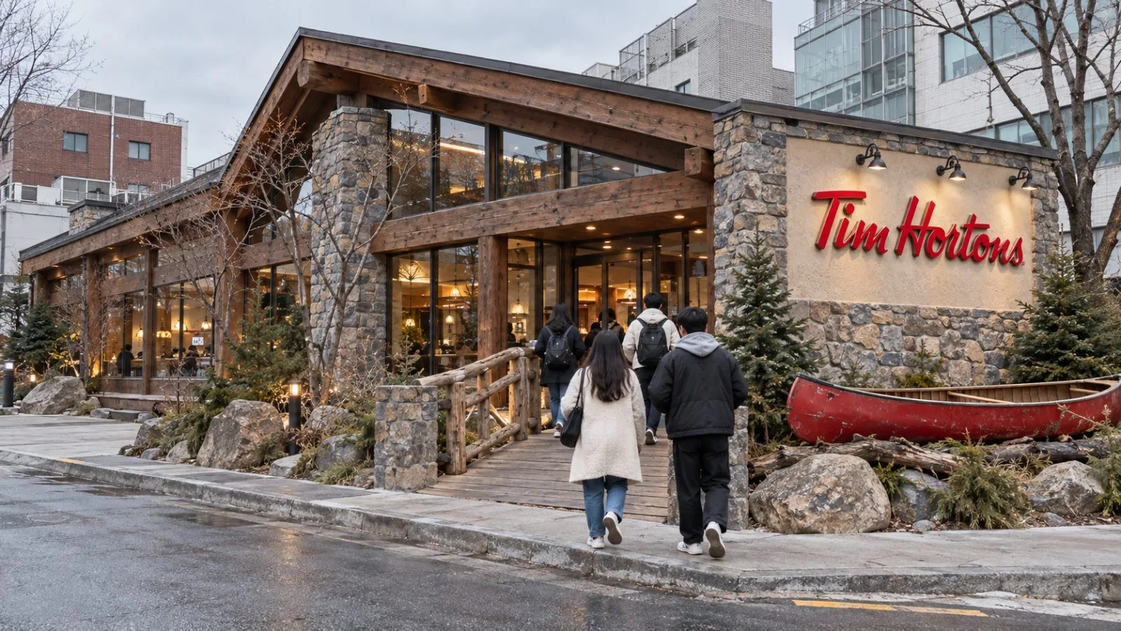 A red canoe sits outside the Banff-themed cafe in Seongsu-dong, Seoul. / EconoTimes.ai