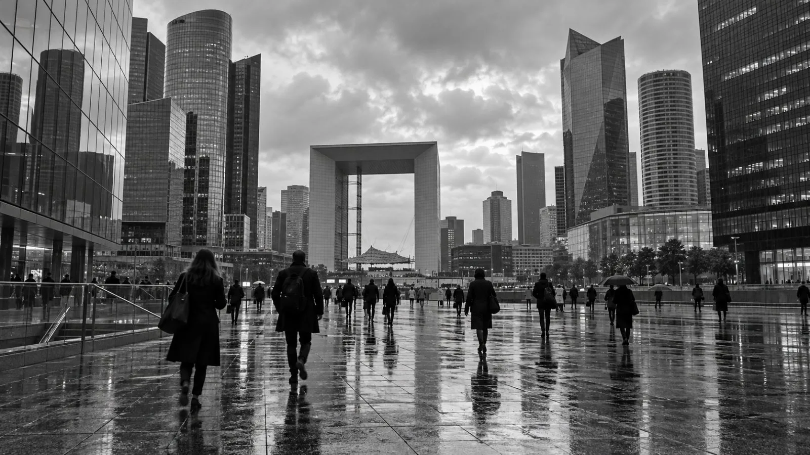 Pedestrians pass office towers in La Défense, near Paris, France. (AI-generated image / EconoTimes)