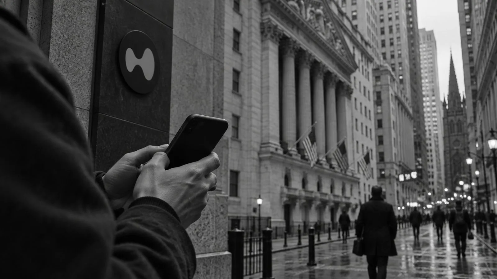 A passerby checks a phone on Broad Street in Manhattan’s Financial District, New York. / EconoTimes.ai