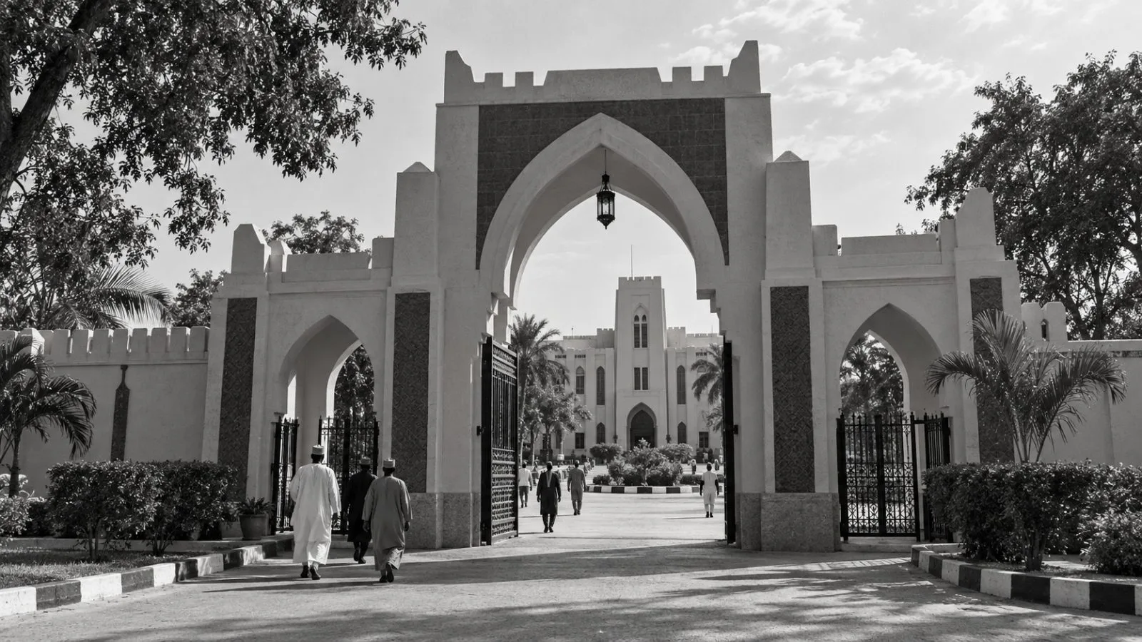 Visitors enter Government House in Kano, Nigeria, during a diplomatic visit. / EconoTimes.ai