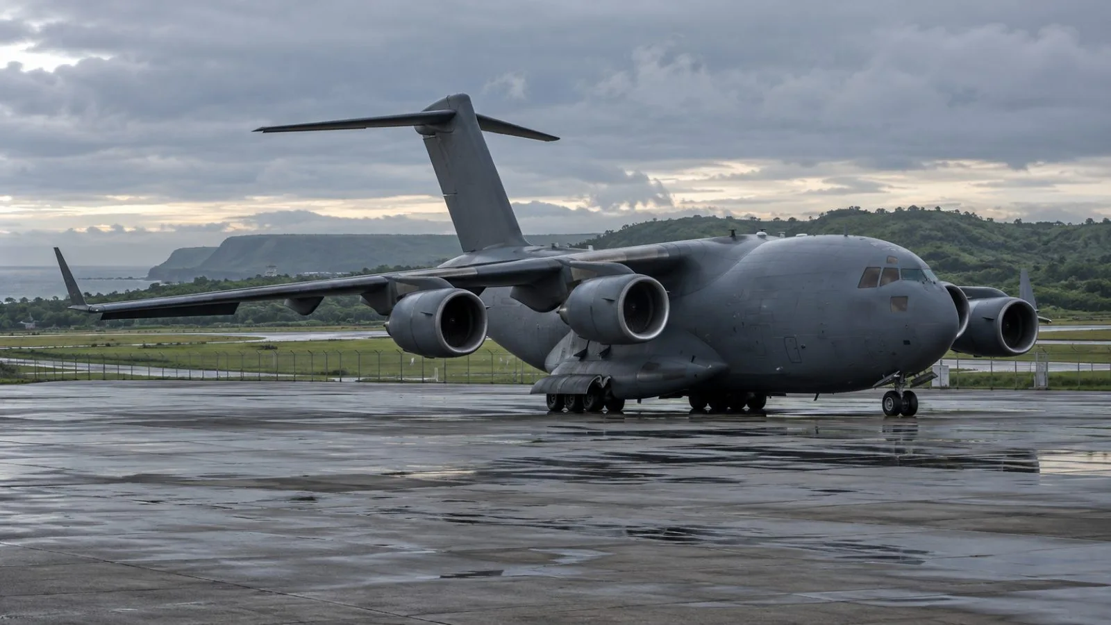 A military transport aircraft sits on the apron at Andersen Air Force Base in Yigo, Guam. (AI-generated image / EconoTimes)