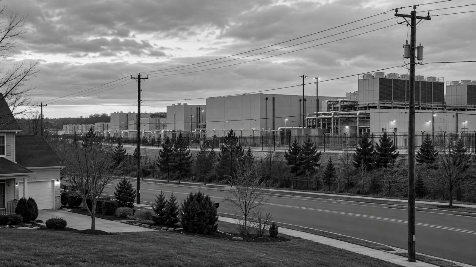 A data center campus stands across a residential road in Ashburn, Virginia. (AI-generated image / EconoTimes)