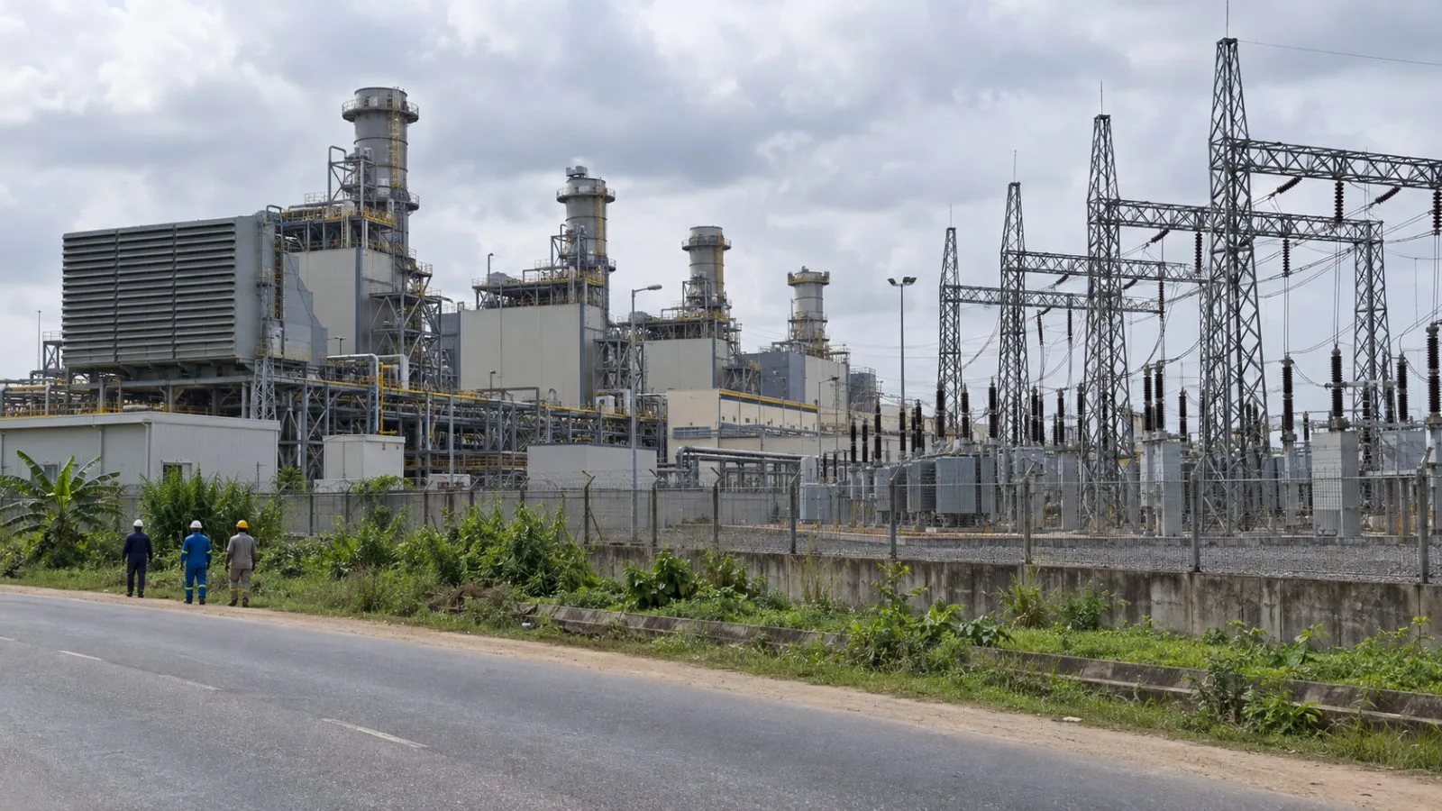 A gas-fired turbine hall and switchyard stand at the Transcorp plant in Ughelli, Nigeria. (AI-generated image / EconoTimes)