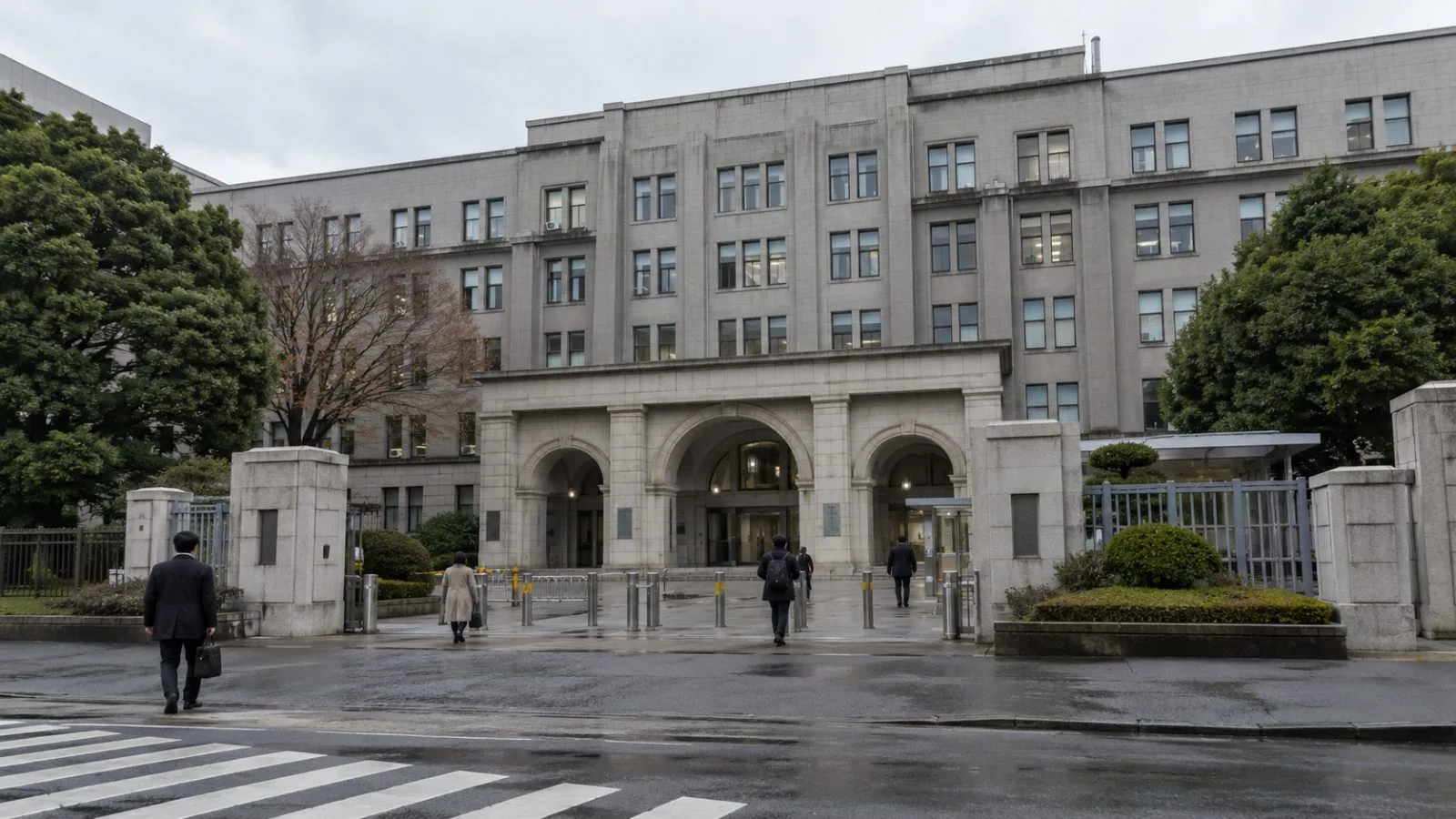 Pedestrians pass Japan's Ministry of Finance building in Tokyo on an overcast morning. (AI-generated image / EconoTimes)