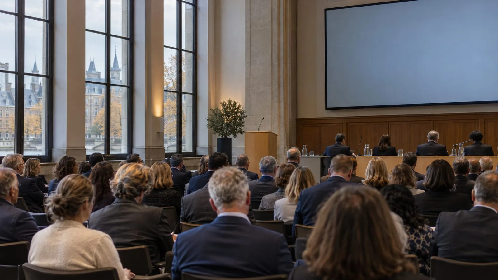 Business delegates gather inside a conference hall in The Hague, Netherlands. (AI-generated image / EconoTimes)