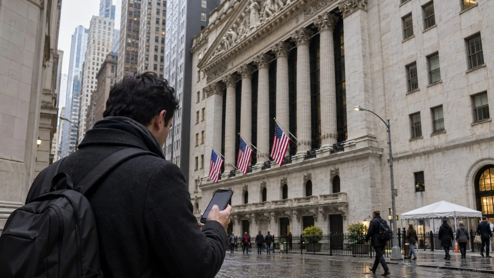 An investor checks a brokerage app on Wall Street in Lower Manhattan, New York City. / EconoTimes.ai