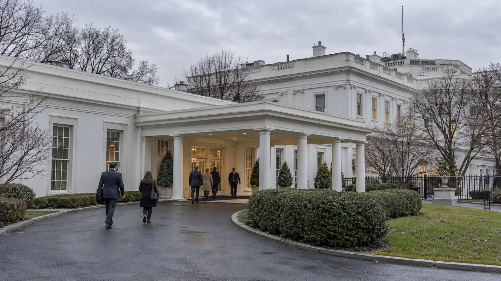 Staff enter the White House West Wing in Washington on an overcast afternoon. (AI-generated image / EconoTimes)