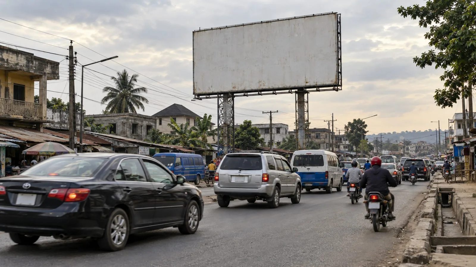 A roadside billboard structure overlooks traffic in Umuahia, Abia State, Nigeria. (AI-generated image / EconoTimes)