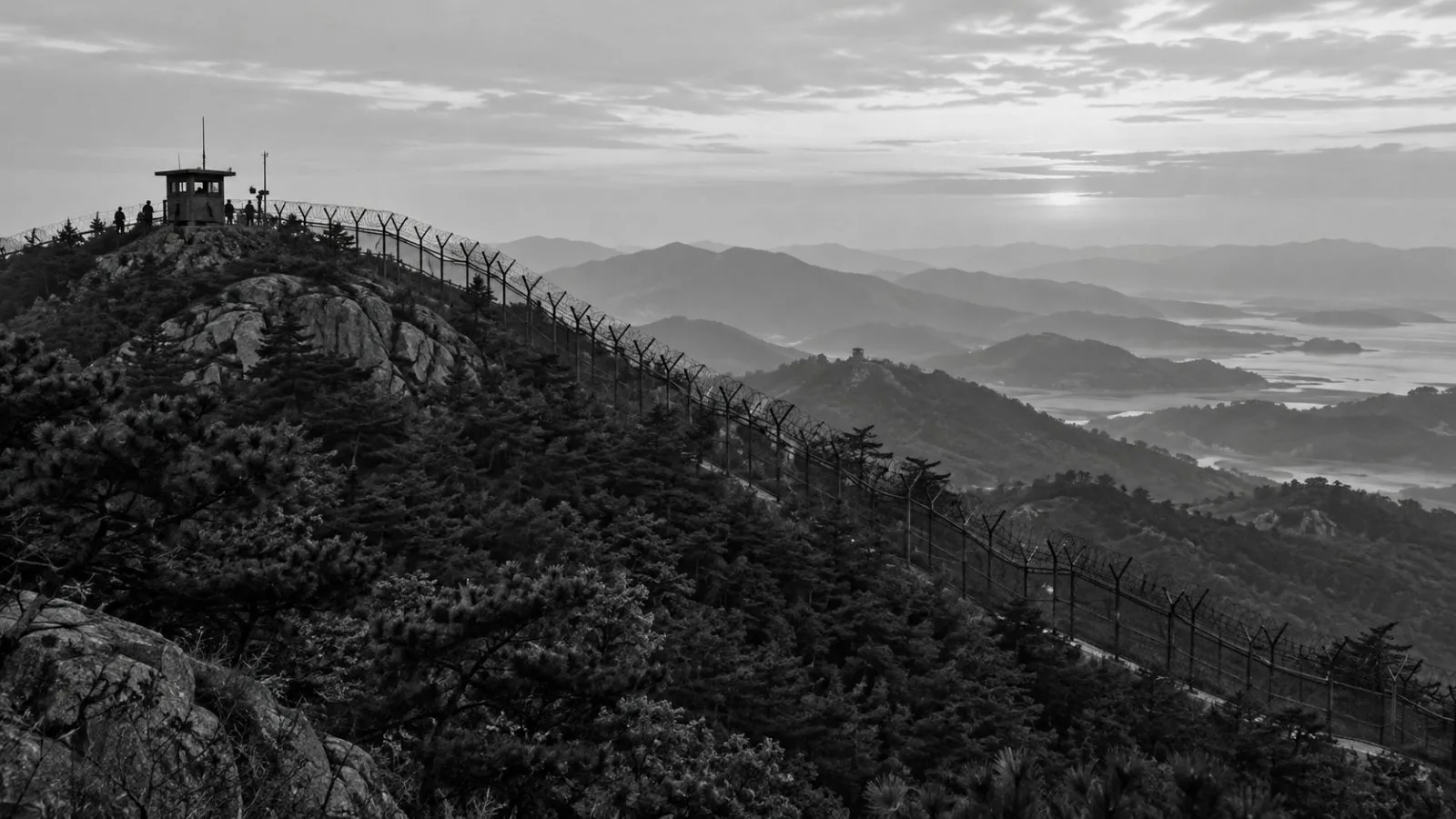 A guard post and perimeter fence mark the DMZ near Goseong, South Korea (AI-generated image / EconoTimes)