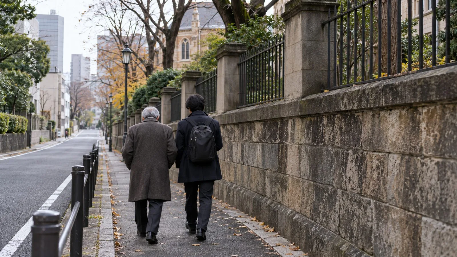 An adult child walks beside an older parent on a quiet street near Keio University in Tokyo. (AI-generated image / EconoTimes)