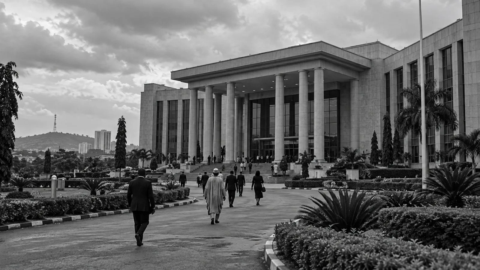 Visitors walk toward the Federal Ministry of Justice building in Abuja, Nigeria. (AI-generated image / EconoTimes)