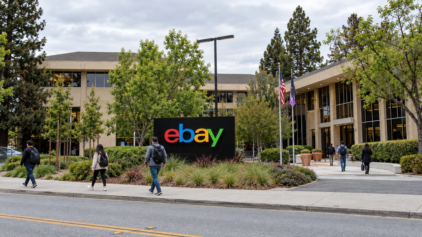 Office workers approach a campus entrance in San Jose, California, under soft morning light. / EconoTimes.ai