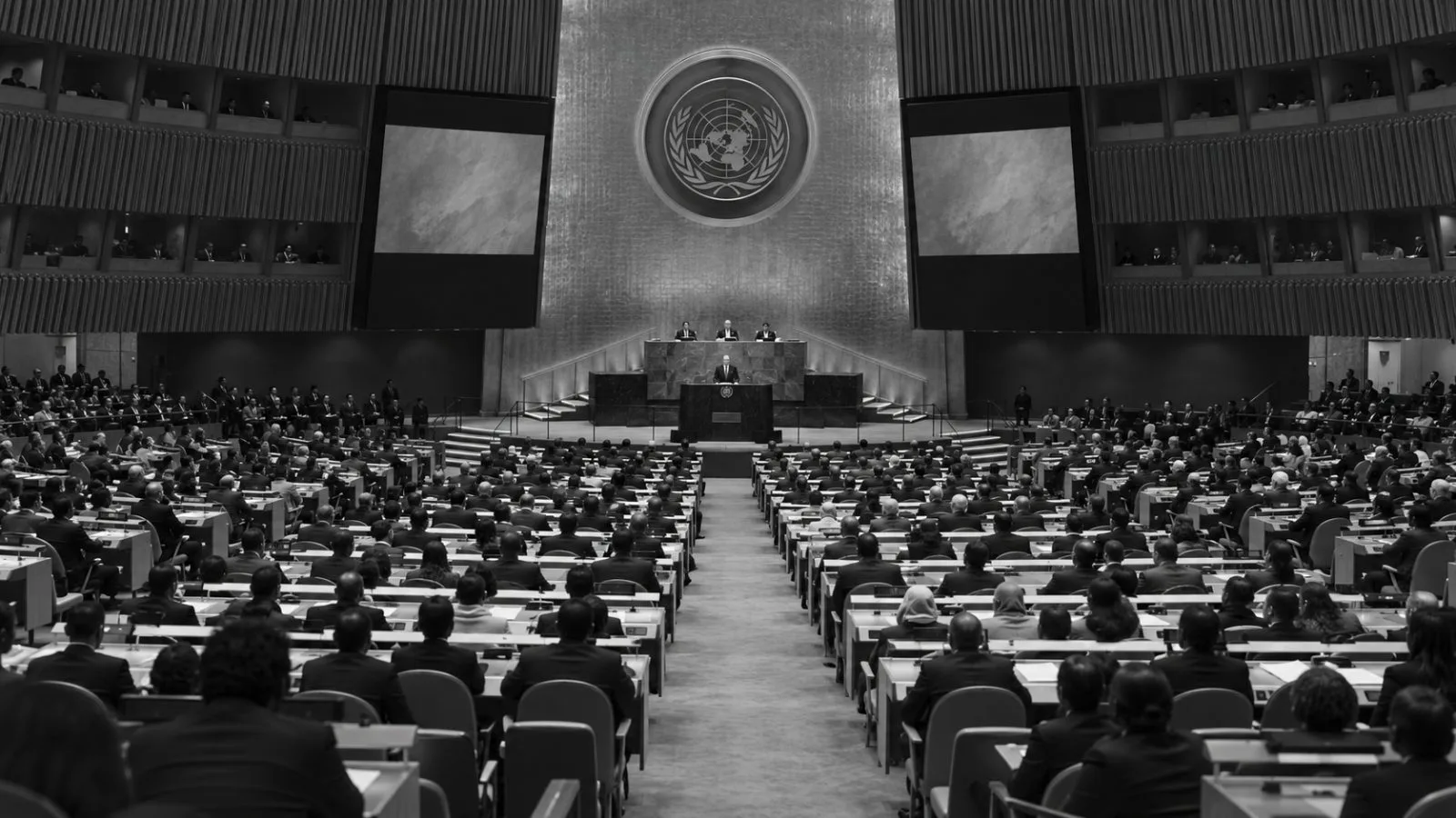 Delegates listen during a General Assembly session at United Nations headquarters in New York. (AI-generated image / EconoTimes)
