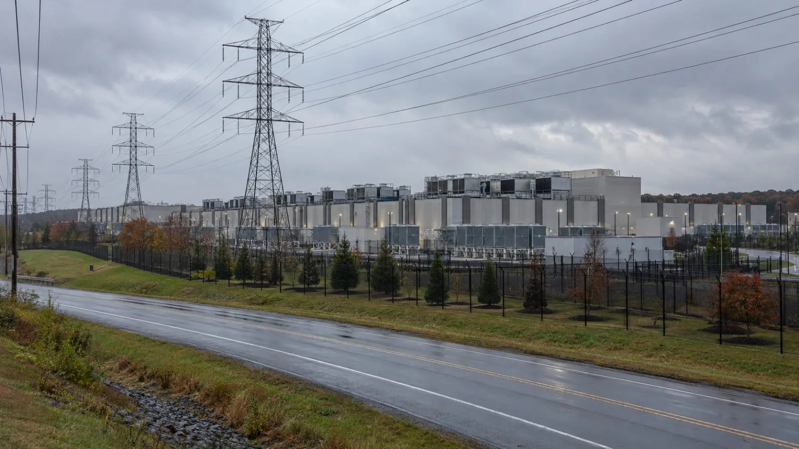 Transmission lines run beside a data center campus in Ashburn, Virginia, United States. (AI-generated image / EconoTimes)