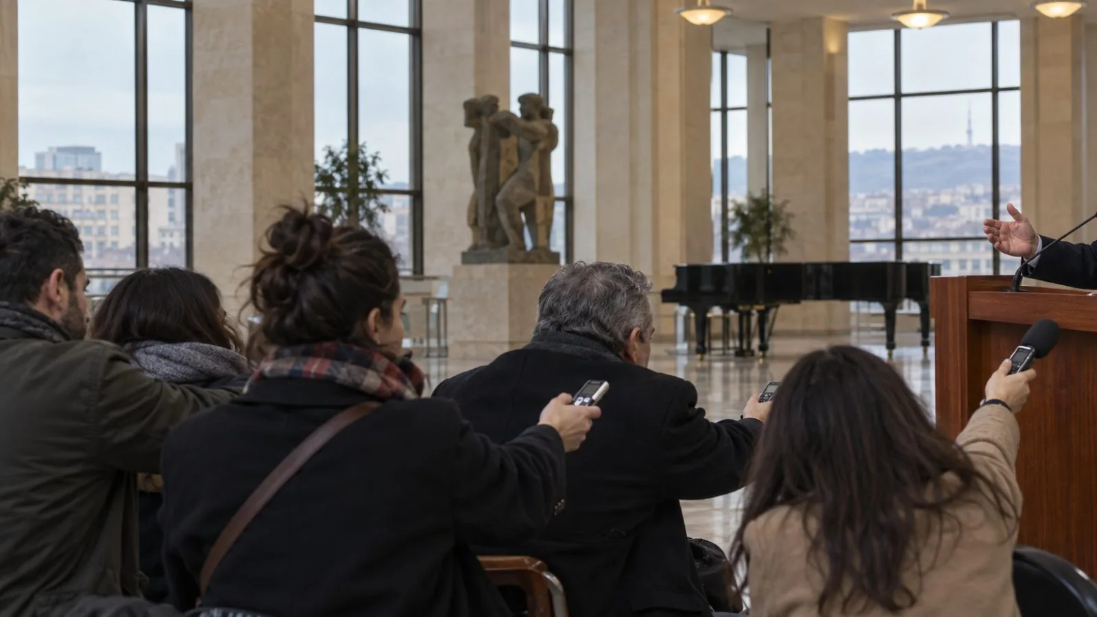Journalists record a press briefing inside The Dvin Music Hall in Yerevan, Armenia. (AI-generated image / EconoTimes)