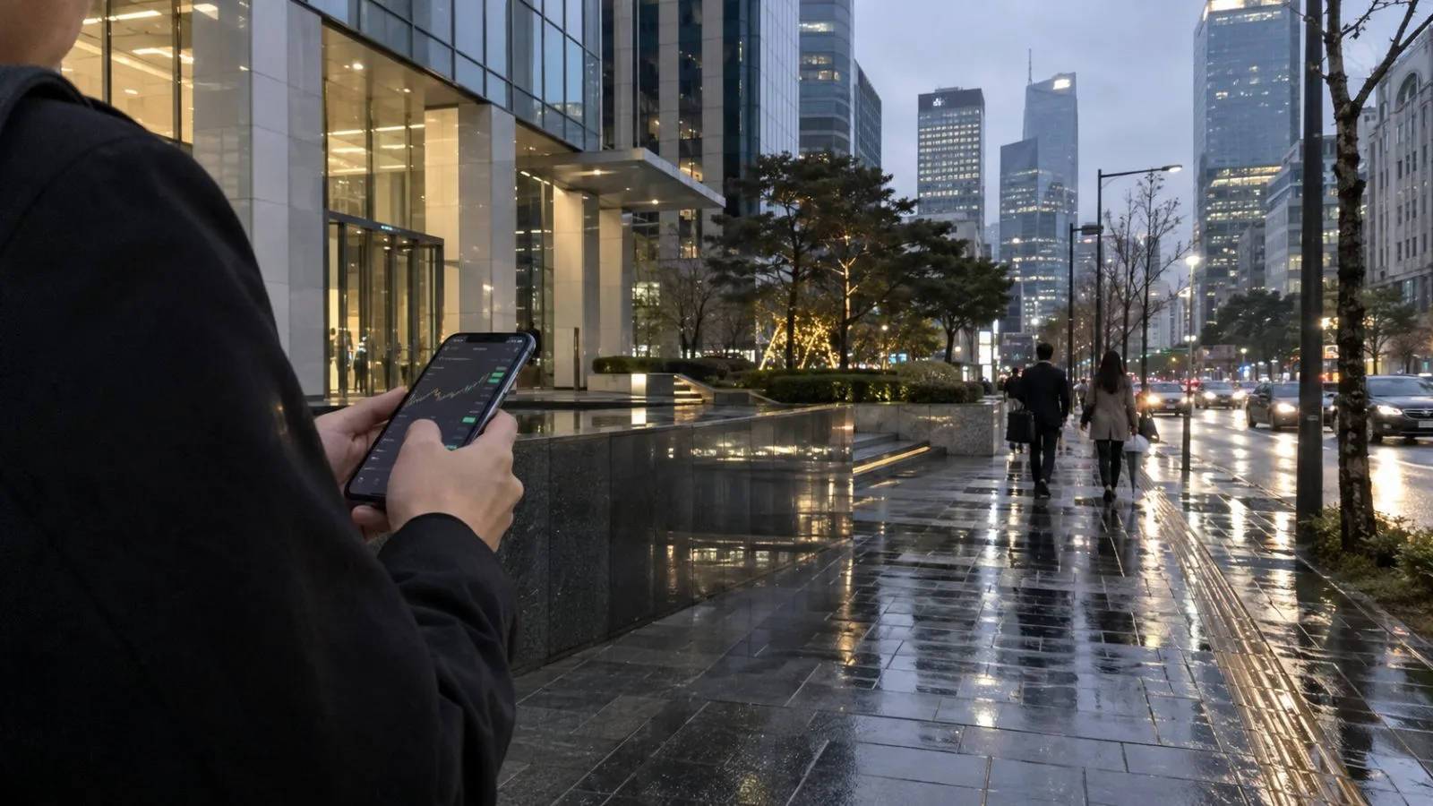 A commuter checks a smartphone on a rain-darkened sidewalk in Seoul's Gangnam district. (AI-generated image / EconoTimes)