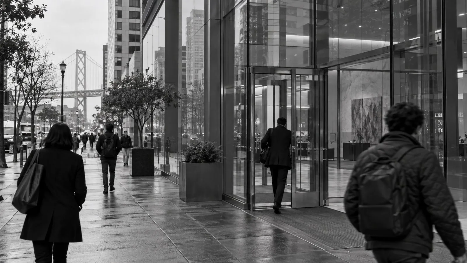 An employee enters SAP Taulia’s San Francisco headquarters on a cloudy morning. (AI-generated image / EconoTimes)
