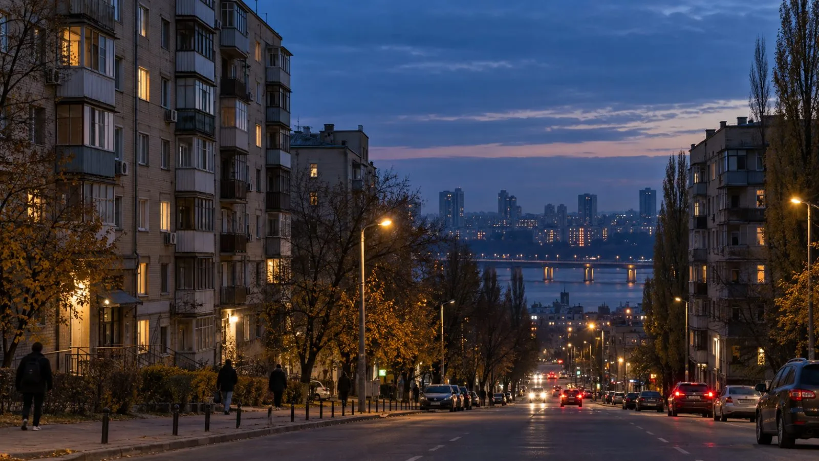 Apartment buildings line a residential street in Dnipro, Ukraine, at dusk. (AI-generated image / EconoTimes)
