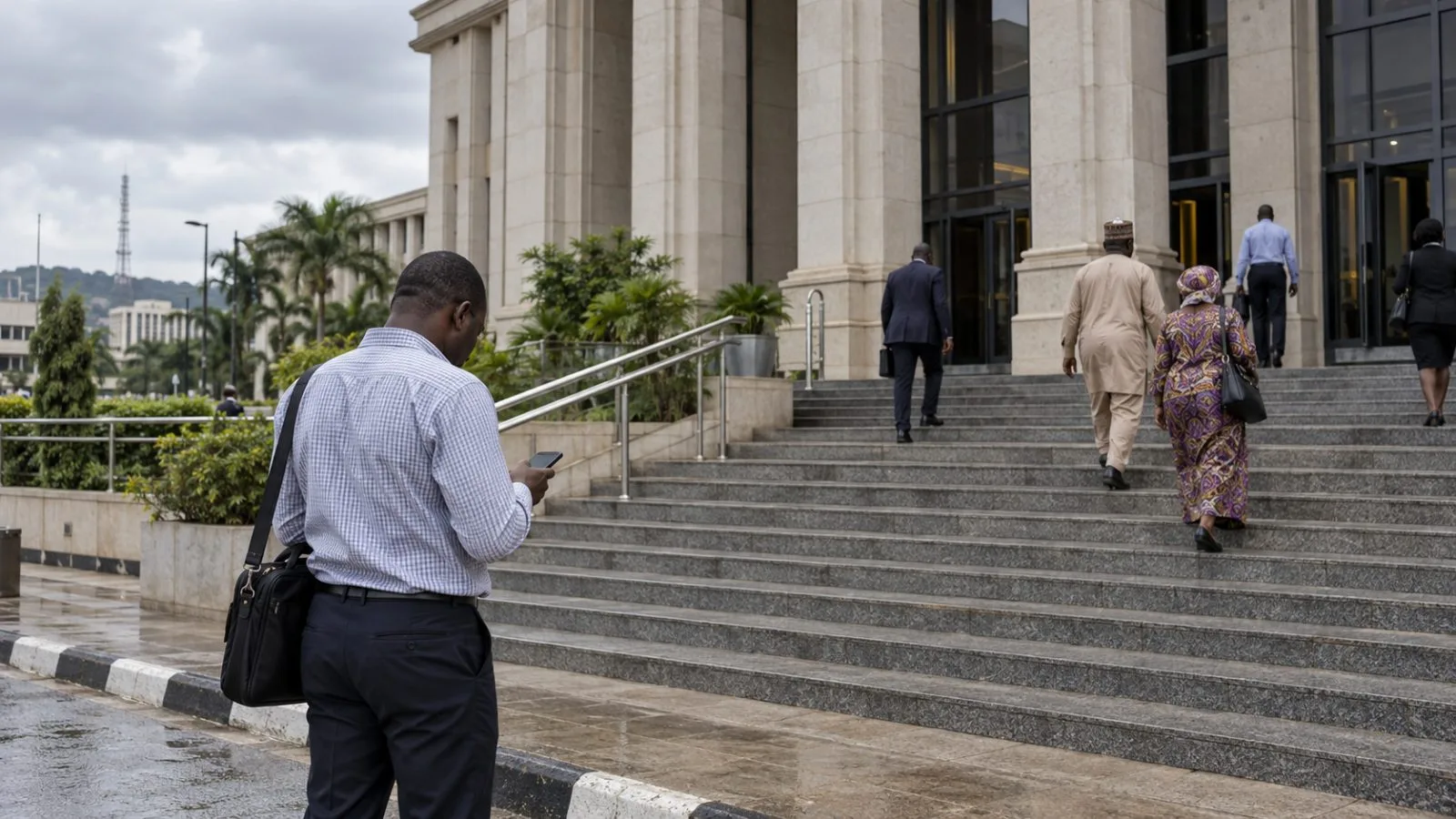An anonymous passerby checks a phone outside a courthouse in Abuja, Nigeria (AI-generated image / EconoTimes)