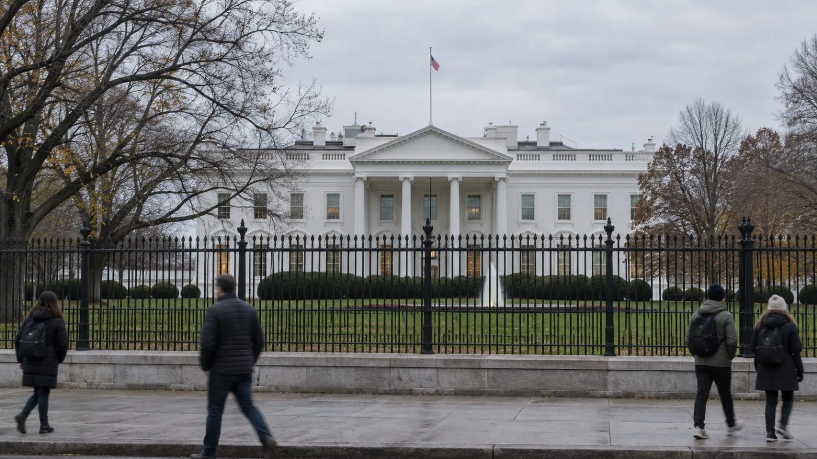 Pedestrians pass the north security fence outside the White House in Washington. (AI-generated image / EconoTimes)